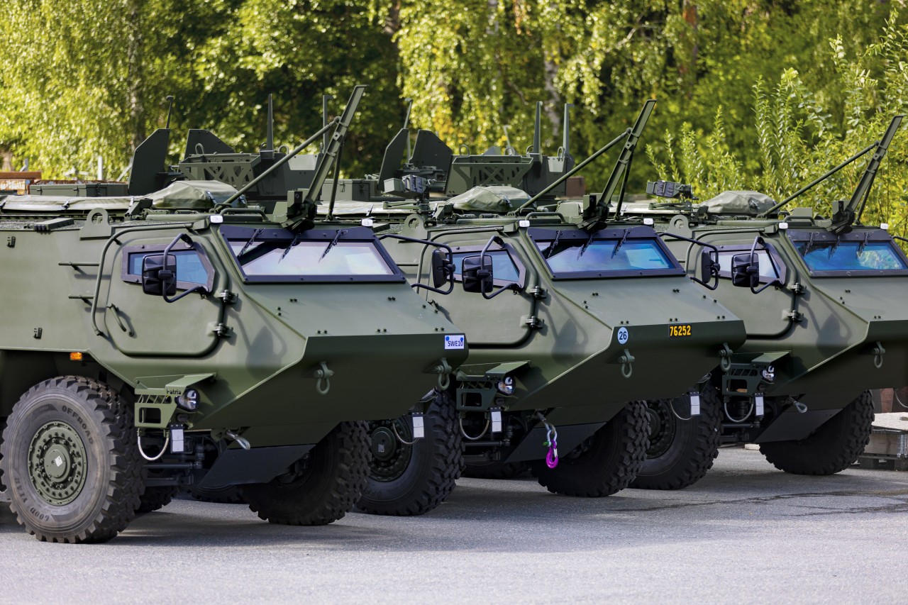 Armoured vehicles in a row.