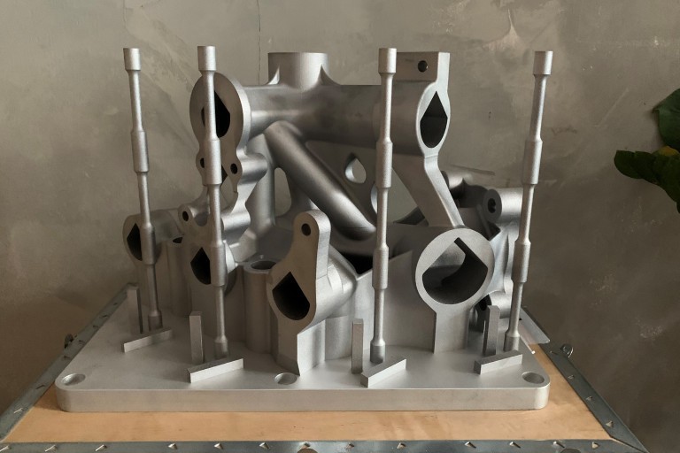 kappaleen suunnittelu Francesco Trevisan Wärtsilän geometrian pohjalta, AM valmistus AMEXCI