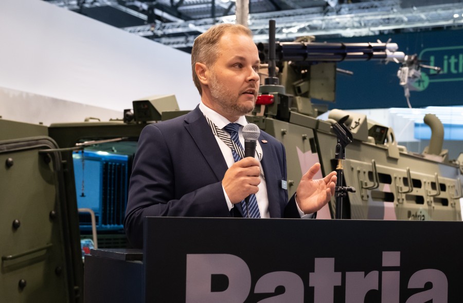 Jussi Järvinen speaking a at an event.