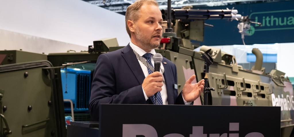 Jussi Järvinen speaking a at an event.